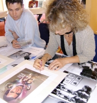 Caroline Bliss signing Jeff Marshall lithograph