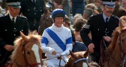 Mounted police escort Bob and Aldaniti to the winner's enclosure after the race