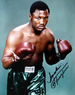 Joe Frazier signed this photograph at the NEC in Birmingham