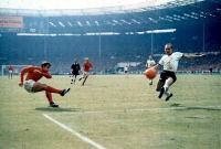 Geoff Hurst scoring England's controversial 3rd goal in the World Cup final