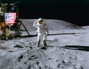Charlie Duke salutes the American flag after landing on the Moon