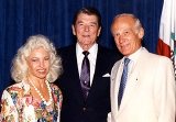 Buzz Aldrin with his wife Lois and Ronald Reagan