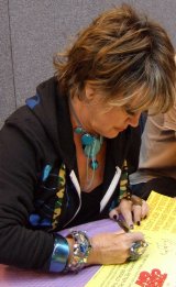 Amanda Barrie signing 'Carry On' poster