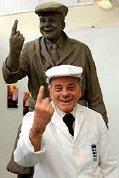 Dickie Bird in the sculptor's workshop, with the clay model of his statue