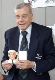 Dickie Bird holding a Royal Doulton 'Dickie Bird' character jug
