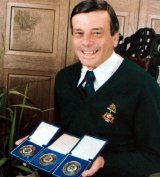 Dickie Bird with his three World Cup final awards