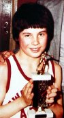 Joe Calzaghe aged 10 with a boxing trophy he won at Pentwynmawr Primary School