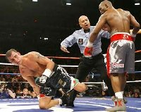 Joe Calzaghe is floored by Bernard Hopkins in 2008