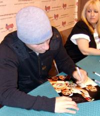 Joe Calzaghe signing Ciaran's photograph at the NEC