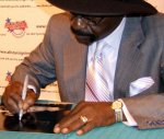 Rubin 'Hurricane' Carter signing photograph