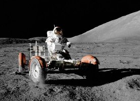 Gene Cernan drives the lunar rover across the moon's surface