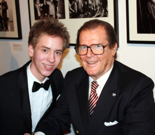 Ciaran Brown with Sir Roger Moore at The National Theatre in London