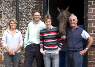 Ciaran Brown with Althea, Nick & Josh Gifford at Downs Stables in August 2011.  The horse is called Vinnie The Pooh.