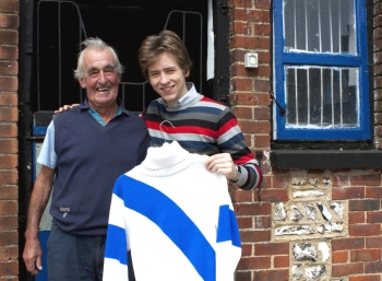 Ciaran Brown with Josh Gifford outside Aldaniti's stable, with his colours