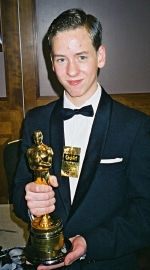 Ciaran Brown holding Norman Wanstall's Oscar