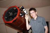 Ciaran brown with Sir Patrick Moore's 15 inch reflector telescope