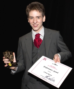 Ciaran Brown with the drama award and certificate presented to him by Paul Nicholas on  27th February 2010