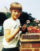 Julian Clary with his kitten, Pao, which he bought for 62p