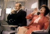 Joan Collins & Leonard Rossiter in one of their famous commercials for Cinzano