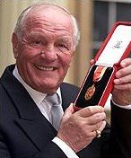 Sir Henry Cooper receives his Knighthood in 2000