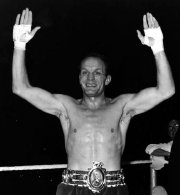 Henry Cooper wearing his Lonsdale Belt