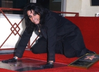Alice Cooper with his 'Walk of Fame' star at No. 7000 Hollywood Boulevard, Los Angeles