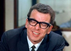 Barry Cryer as Roger the TV Director in 'Primitive London' (1965)