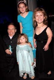 Warwick Davis and family