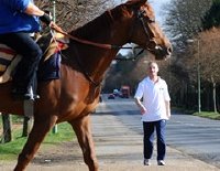 Richard Dunwoody walking along Newmarket's Bury Road during his '1000 miles in 1000 hours' challenge