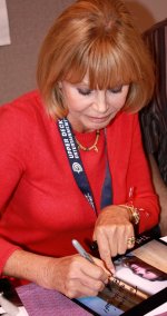 Britt Ekland signing photo at Memorabilia in 2008