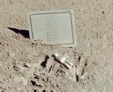 The small statuette and list of dead astronauts, as placed by Dave Scott on the Moon's surface.