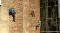 Jonathan Foyle & Lucy Creamer being filmed at the new Coventry Cathedral in 'Climbing Great Buildings'