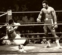 Joe Frazier is knocked to the floor by George Foreman in 1973