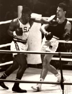 Joe Frazier fighting Huber during the 1964 Olympics