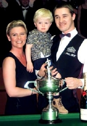 Stephen Hendry with his wife Mandy, and son Blaine, after defeating Mark Williams in the World Championship final in 1999