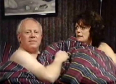 Reg (Ken Morley) & Maureen (Sherrie Hewson) find their water bed is leaking, in 'Coronation Street' (1994)