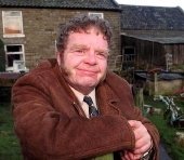 Geoffrey Hughes as Vernon Scripps in 'Heartbeat'