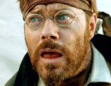 Eddie Izzard as Prosit Luckner in 'Blueberry' (2004)