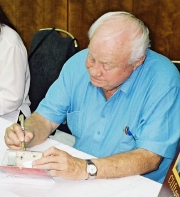 Clifton James signing Corgi model