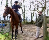 Jethro discusses one of his horses with his stable girl