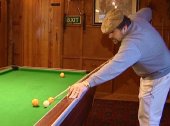 Jethro enjoys a game of pool at 'Jethro's Club'