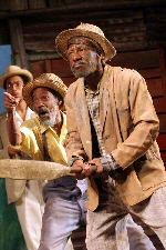 Danny John-Jules as Mac in Playboy of the West Indies