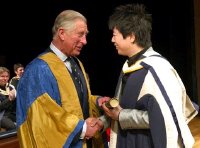 Lang Lang receives his Hon DMus degree from Prince Charles at the Royal College of Music in May 2011