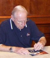 Jim Lovell signing photograph