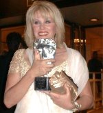 Joanna Lumley with her BAFTA award