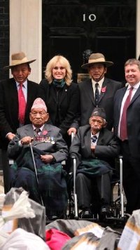 Joanna Lumley, with a group of Ghurkas, take a petition to No 10 Downing Stree