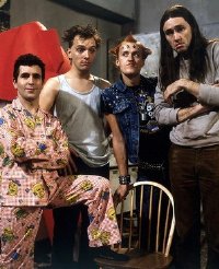 Christopher Ryan, Rik Mayall, Adrian Edmondson & Nigel Planer in 'The Young Ones'