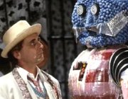 Sylvester McCoy as The Doctor confronts The Kandy Man in 'Doctor Who - The Happiness Patrol'