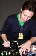 Paul McGann signing 'Alien 3' masterprint