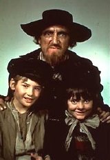 Ron Moody with Mark Lester & Jack Wild from 'Oliver!'